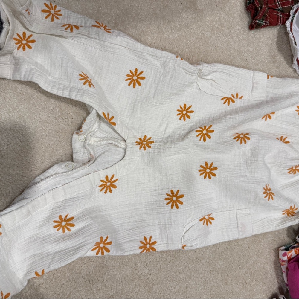 Little Earth Cream Jumpsuit with Orange Accents